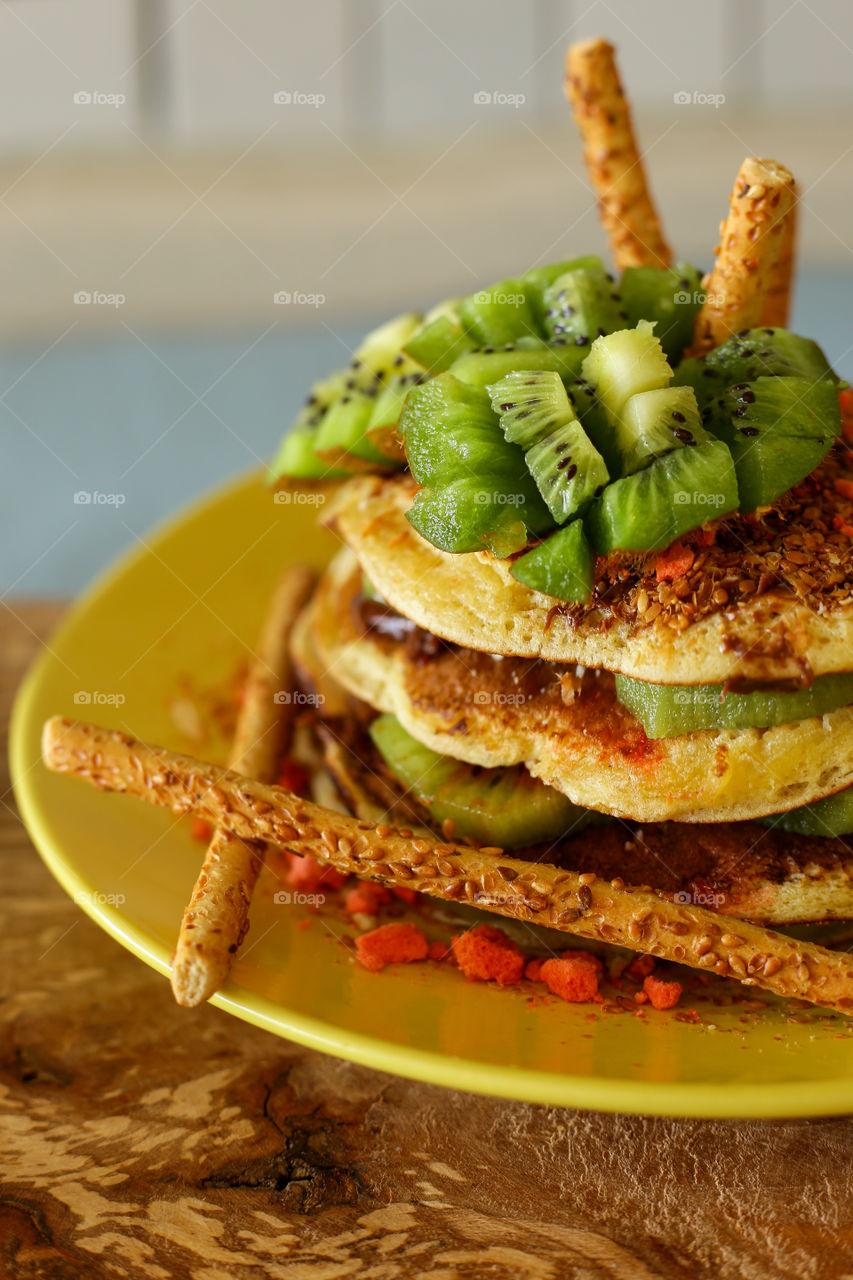 Pancakes with chocolate and kiwi