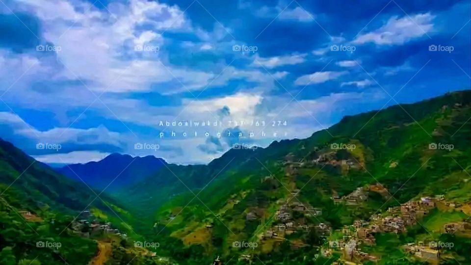 Glory be to God, the magnificent and picturesque view and the natural green trees are a view that is nothing more wonderful than it