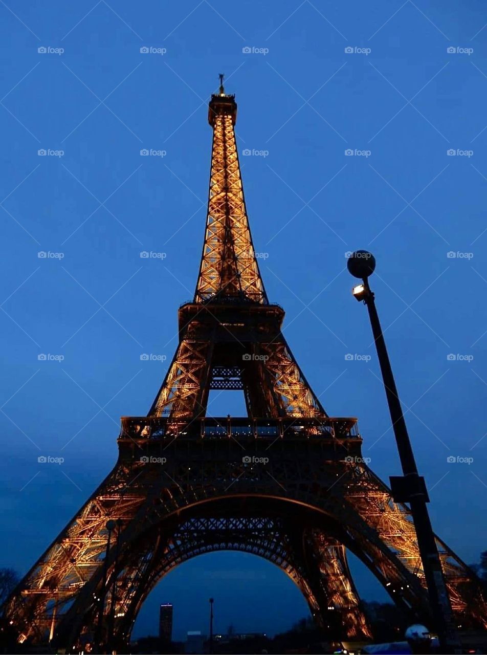 The Eiffel Tower in Paris, France in the evening. 