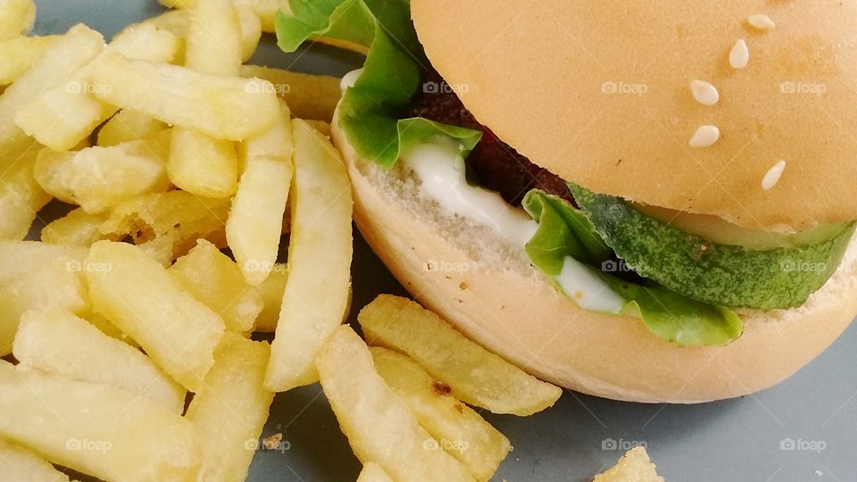 Vegetable burger and potato fries.