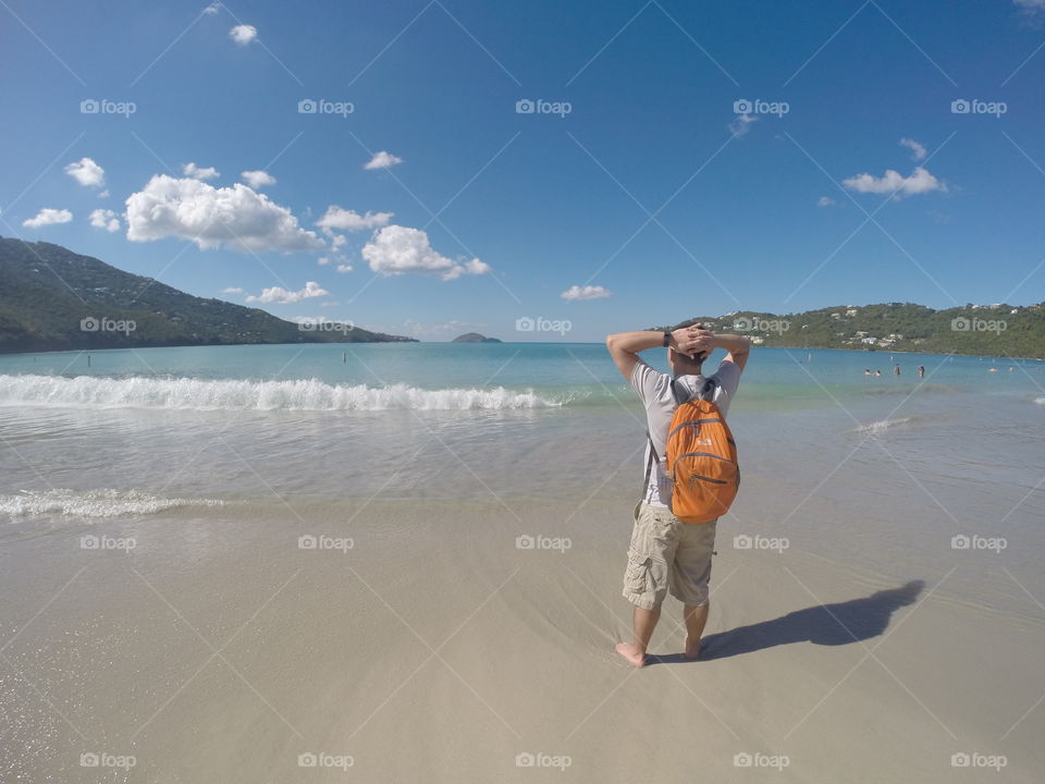 Guy looking off into paradise 