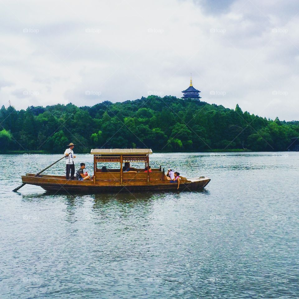 Rowing boat on a lake. Pleasure boat on West Lake in Hangzhou, China