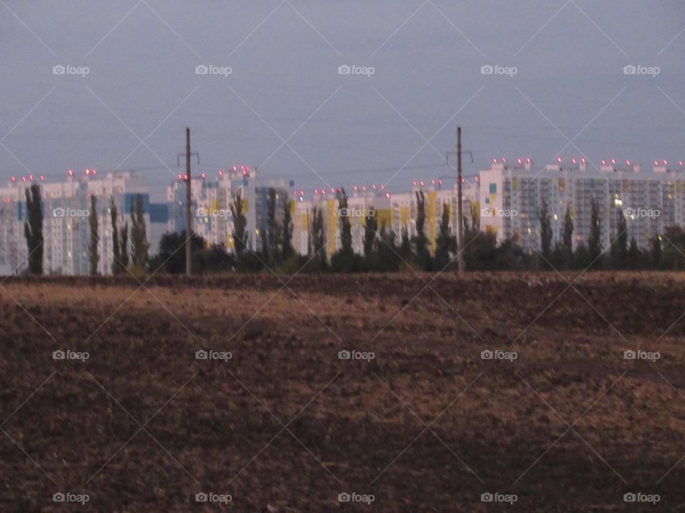 plowed field on the outskirts of the city of Voronezh, Russia, autumn, September, October, earth, sky