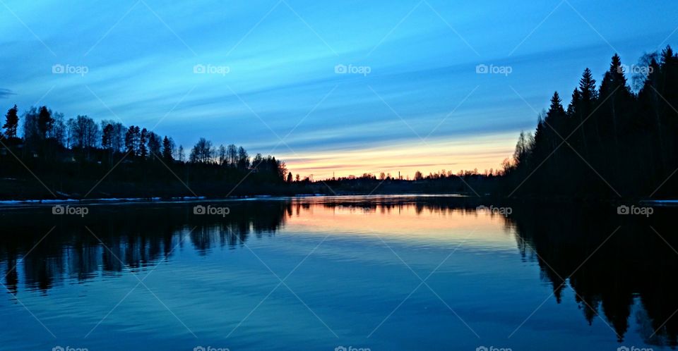 Blue heaven. Fishing trip with blue night sky