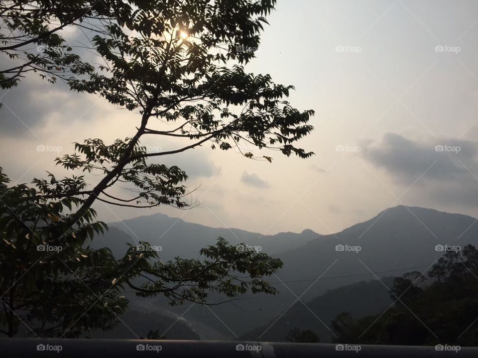 Mountain scene with gleam of sunset 