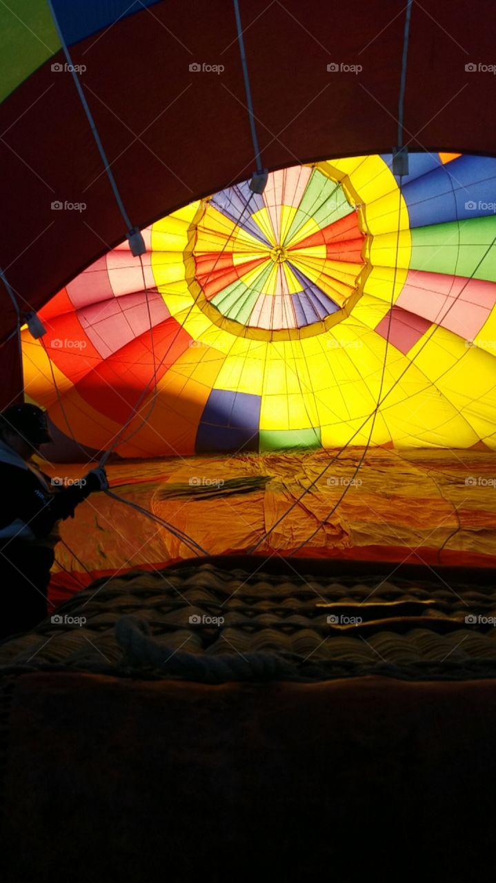 Bright colorful inside of a hot air balloon inflating