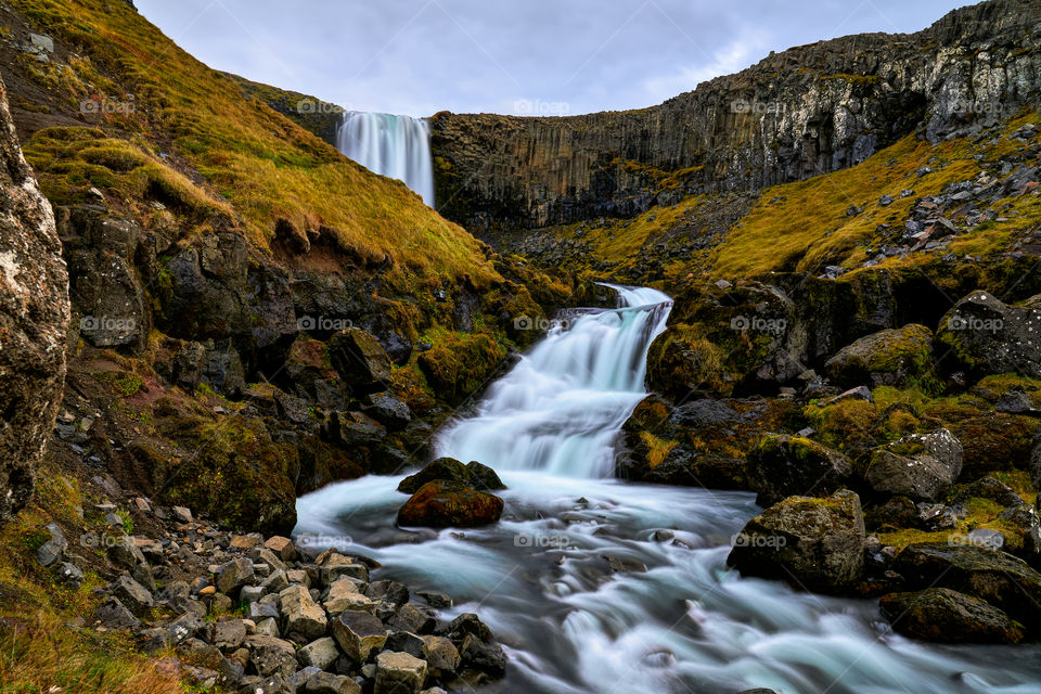 Dramatic Svodufoss waterfall with water of river Laxa dropping ten meters is located in Olafsvik Snaefellsnes which is peninsula in Western Iceland. Here photographed in early October 2019.