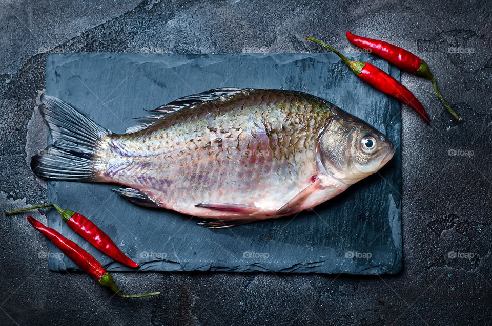 raw fish with chili pepper - ingrediens for baked food