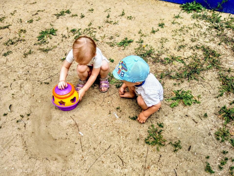 Children play outside.