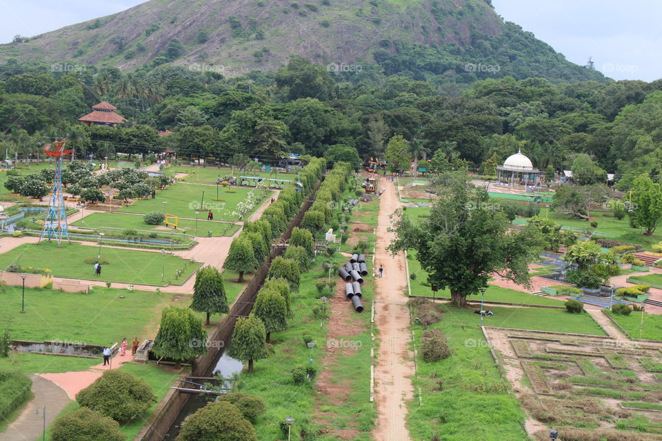 Malampuzha gardens, located in the lower hills of the Western Ghats, are the only rock-cut gardens in South India.  The entire garden is made from broken pieces of bangles, tiles, used plastic cans, tins and other waste materials.