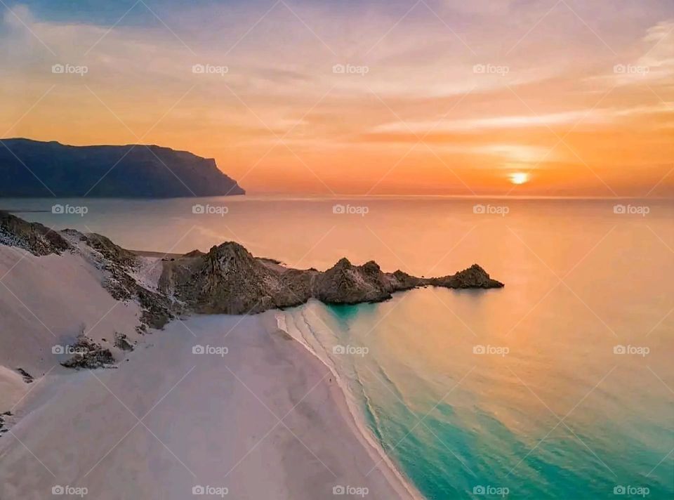 A stunning view of green mountains covered in fog in Yemen