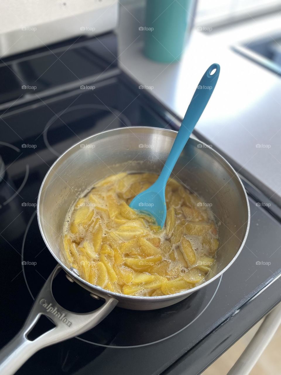 Cooking peaches on stove, making peach cobbler, baking at home with toddlers, making peach cobbler from scratch 