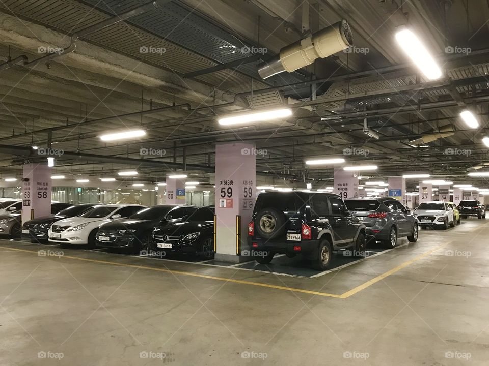 Parked Cars in Basement Floor of Building