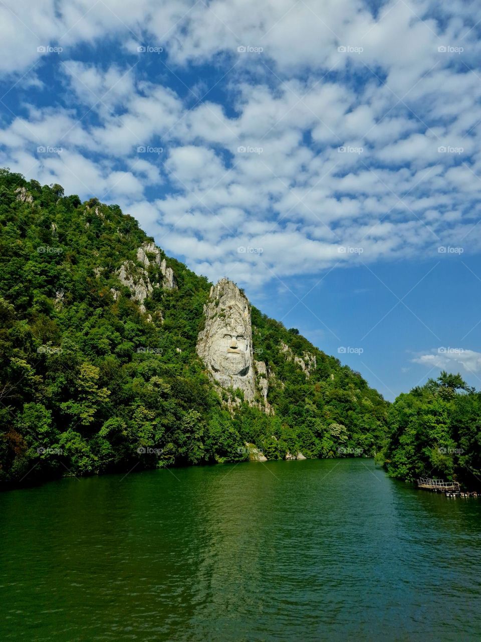 mountain landscape, river and the head of the Dac king, Decebal