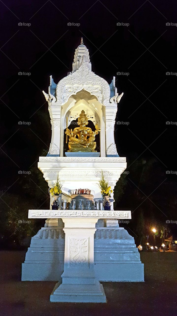 Statue in the evening in Thailand. They are everywhere.