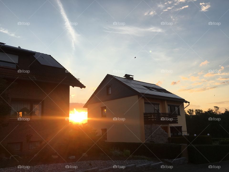 Houses and sun