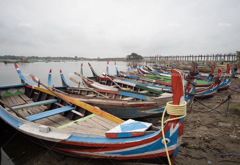 Colorful local life , Beautiful boats at U bien , the longest wooden bridge in Mandalay Myanmar