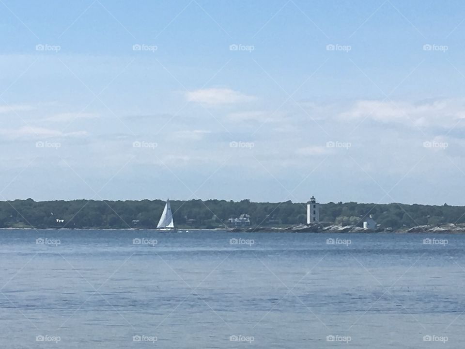 Rhode Island’s beautiful ocean, sailboats and lighthouses.