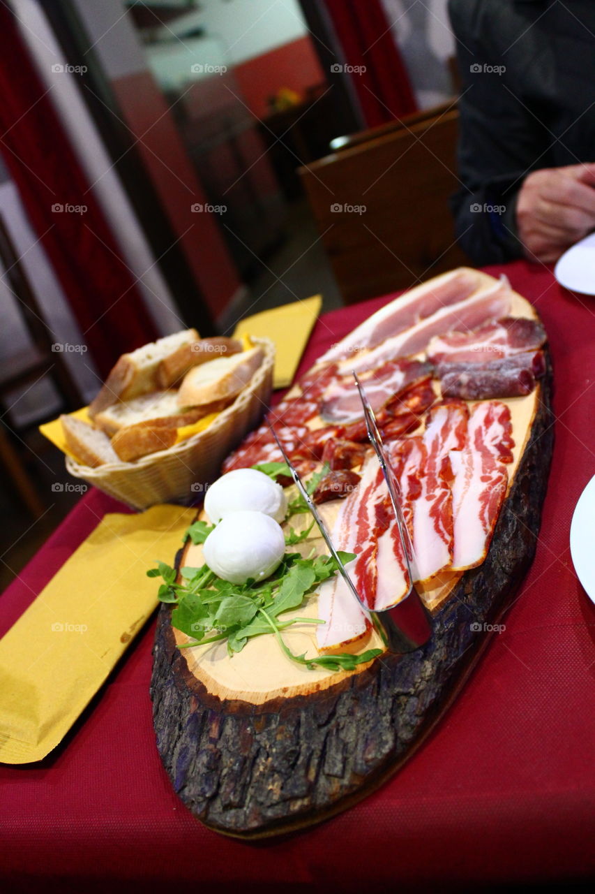 Prosciutto,  hamm,  bread,  bufala muzzle,  mozzarella di bufala.  History pub,  Casaletto Spartano,  Italy.