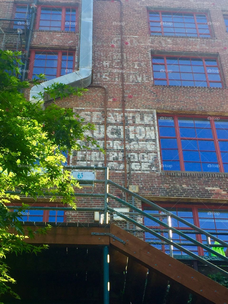 Old brick building in a modern city.