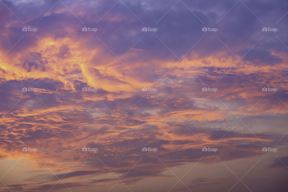 Sky and clouds reflected the morning sun.