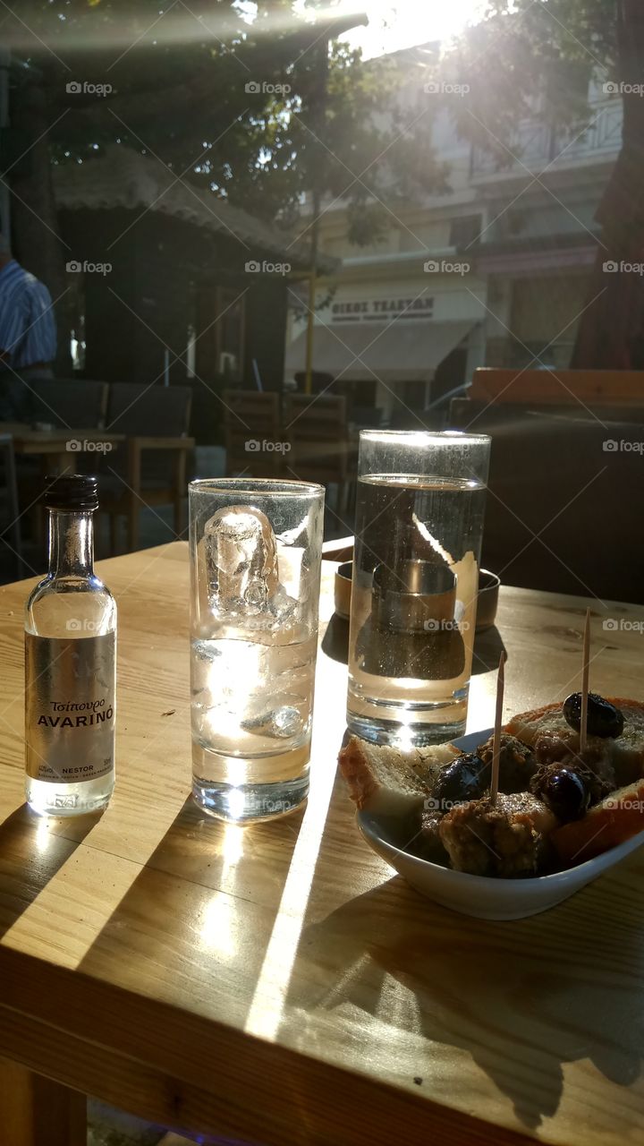 drinking tsipouro in Greece