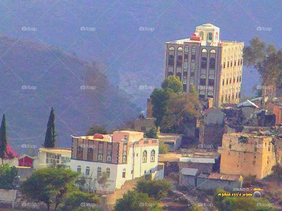 A stunning view of green mountains covered in fog in Yemen