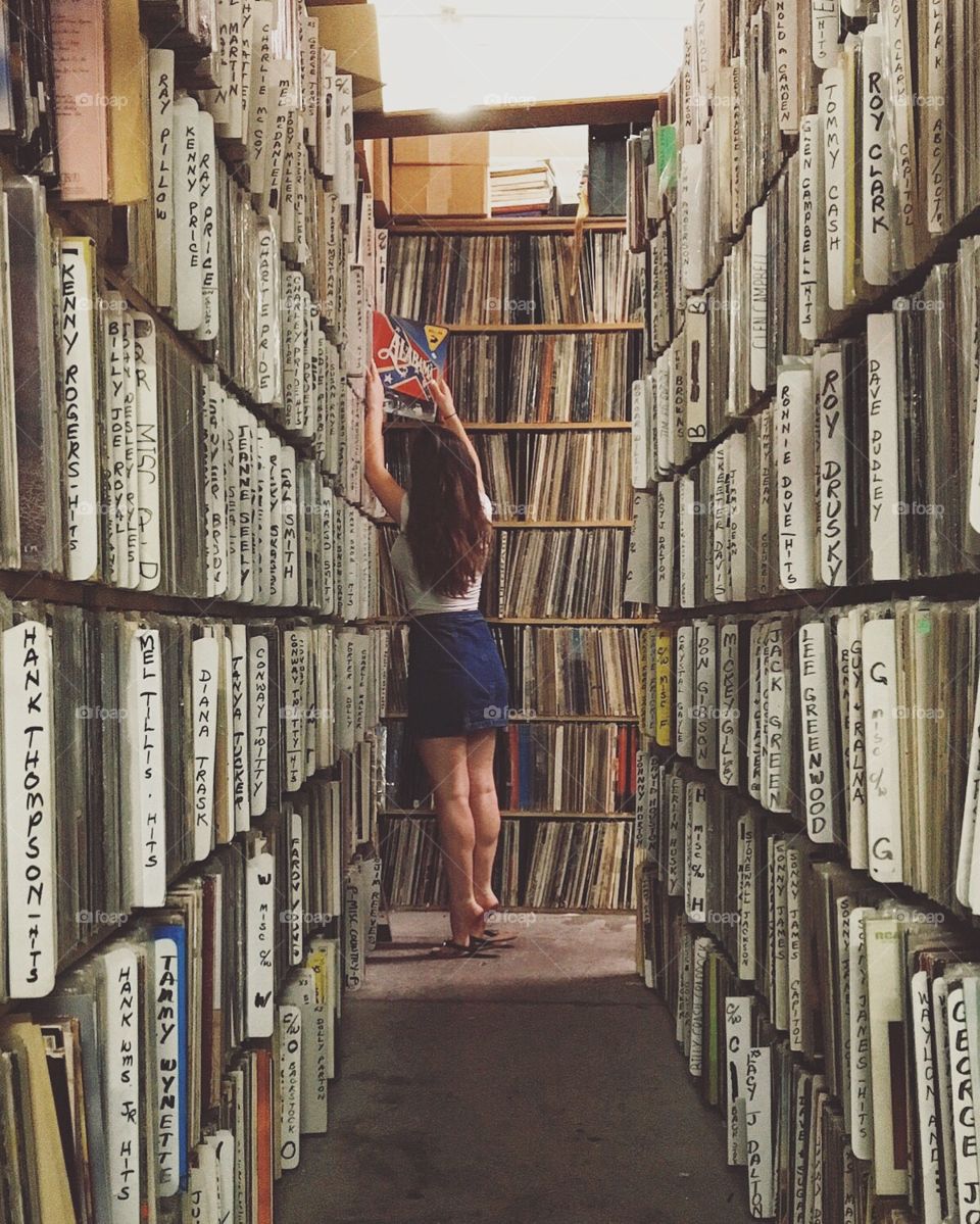 Girls searching for records.