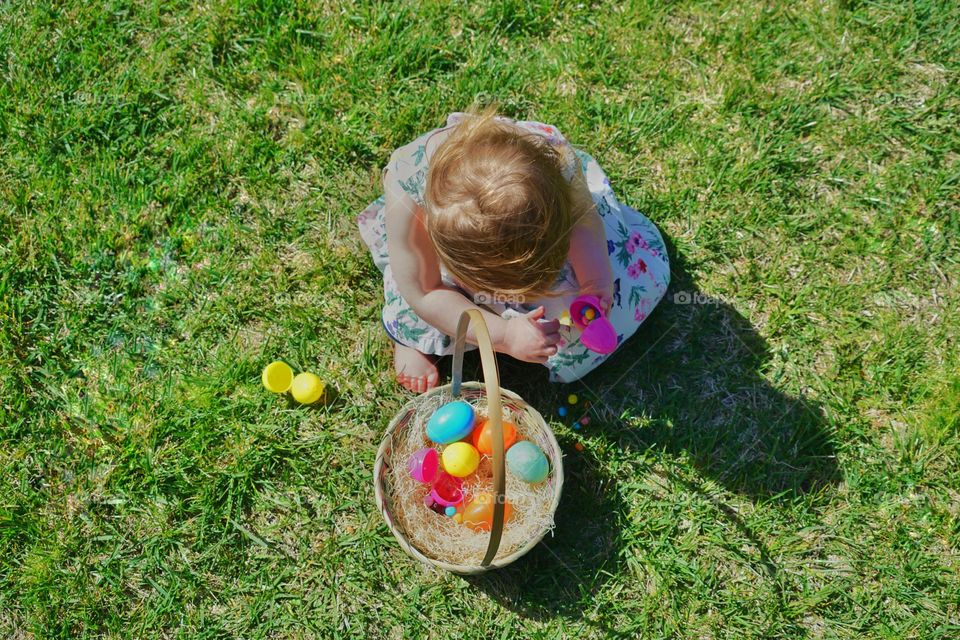 Young Girl In Sunlight With Easter Basket