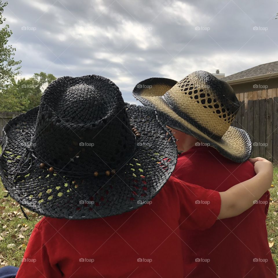 Boys in cowboy hats