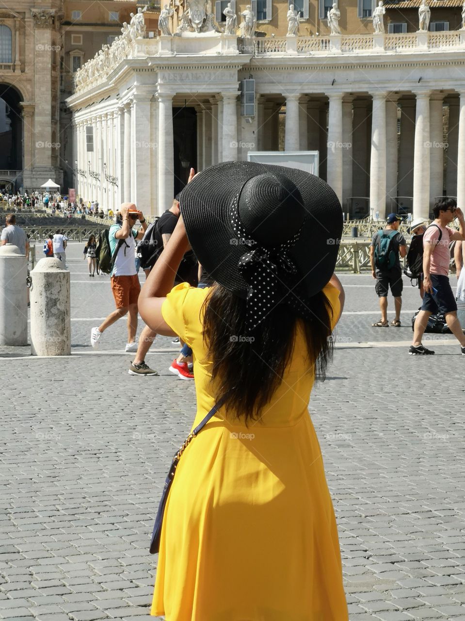 Woman taking a picture in Vatican City
