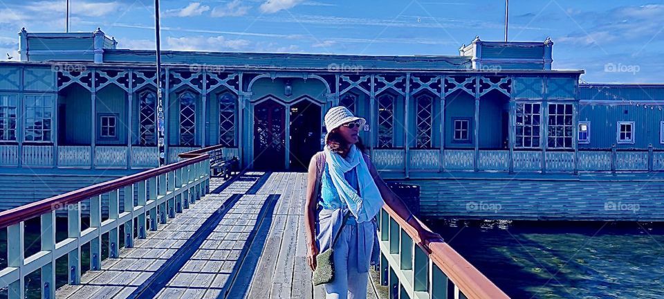 The large building in the background is the “Ribersborgs Kallbadhus” in “Malmö”, “Sweden” by the “Baltic Sea”. It offers a sauna, pool and bathing opportunity in the ocean next to the bathhouse. 2023. Hypnotic Productions