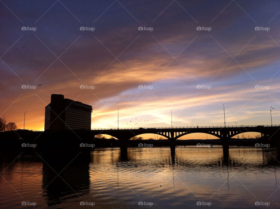 Bat bridge, Austin Texas. Sunset over the river. 