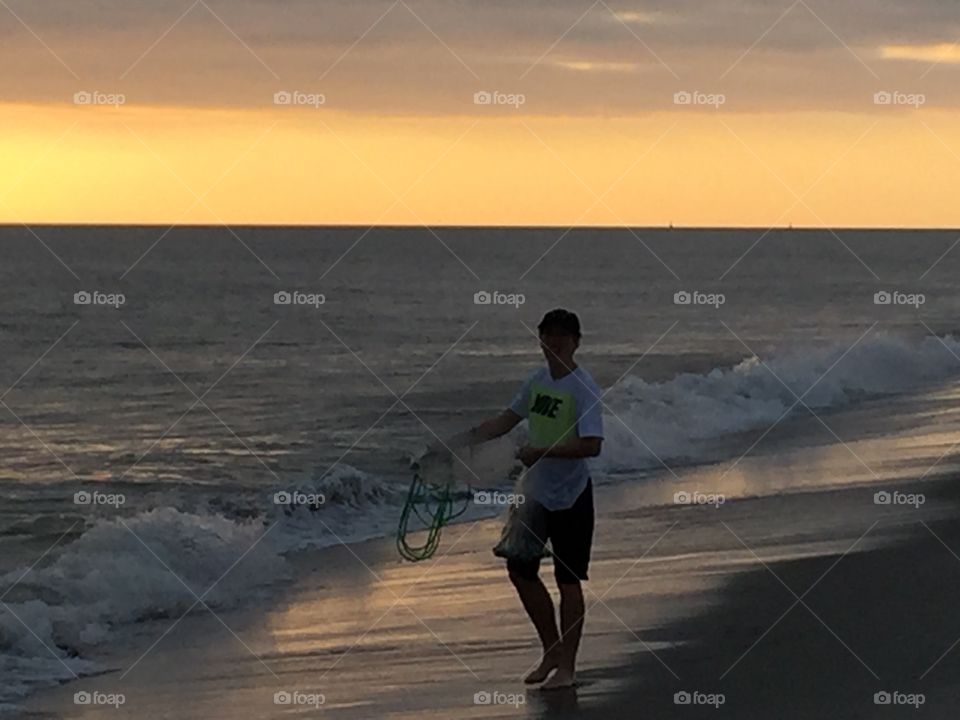 Net fishing at sunset | Bald Head Island, NC