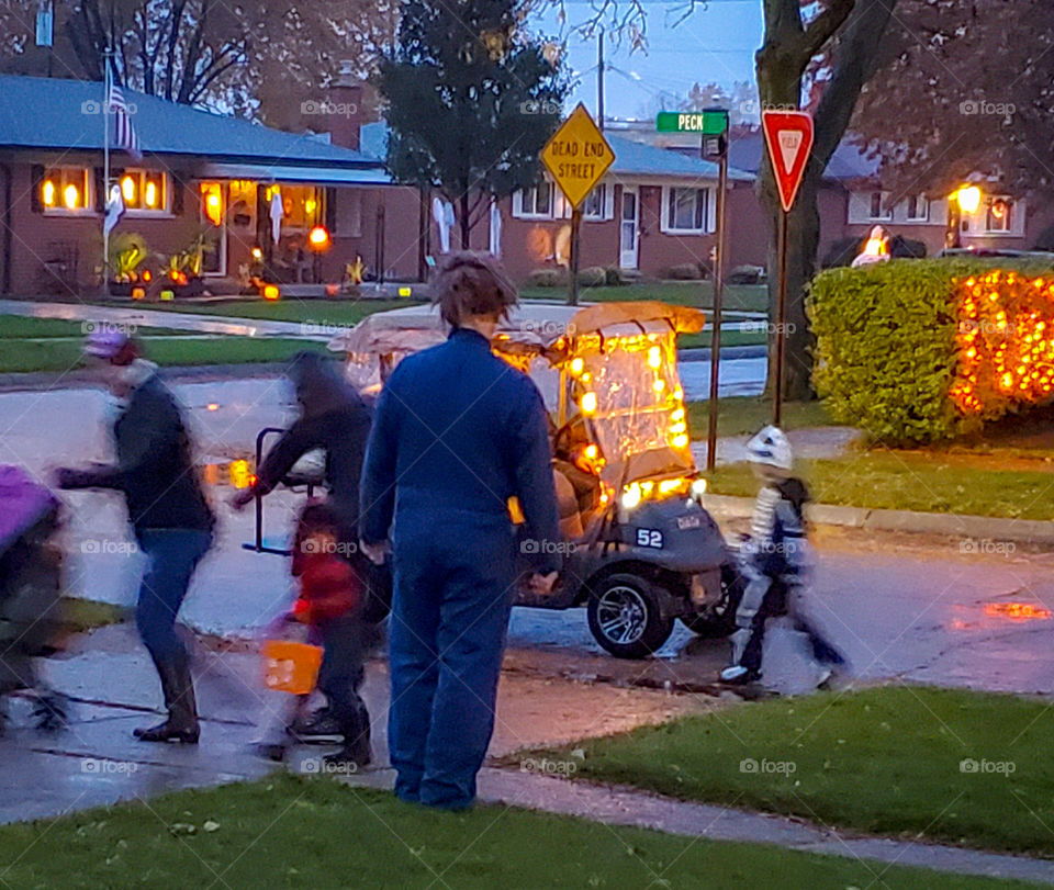 Celebrating Halloween,  with Michael Meyers greeting the trick or treaters.
