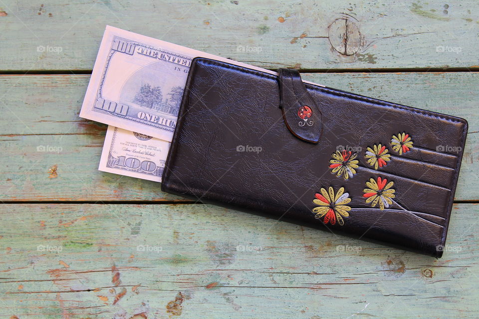 money and leather wallet