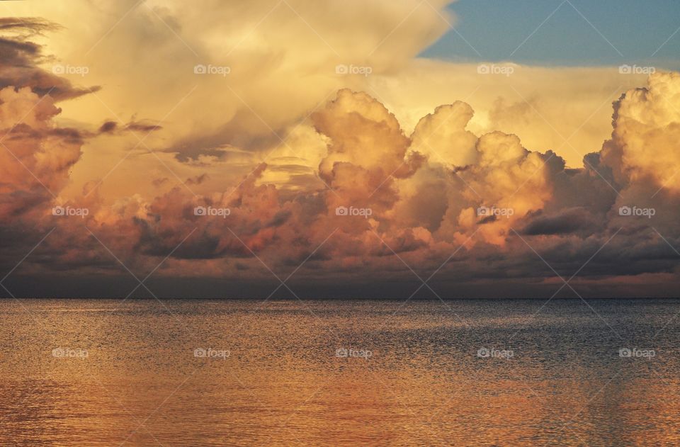 dramatic sunset sky during summer sunset over the baltic sea in poland
