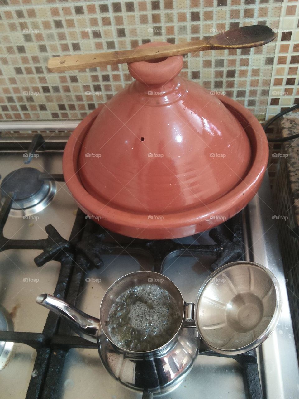 a tajine and a kettle of tea.