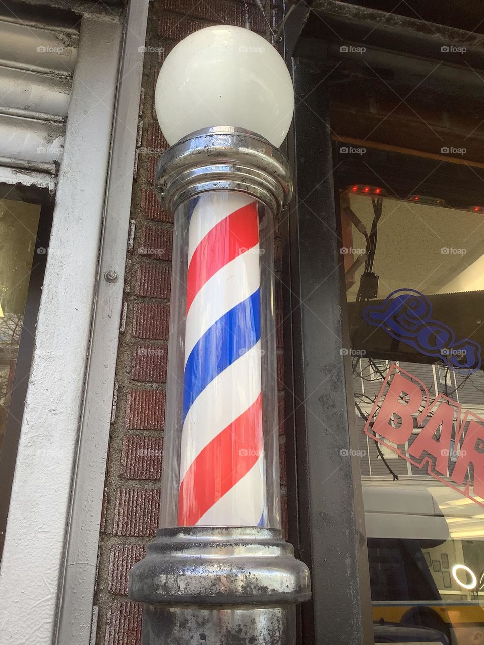 I'm photographing much more lately. I'm seeing everyday signs, symbols, etc. that I usually take for granted. I now wonder how this became universal for barbers.