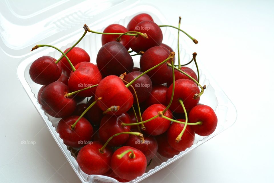 red cherry summer food white background