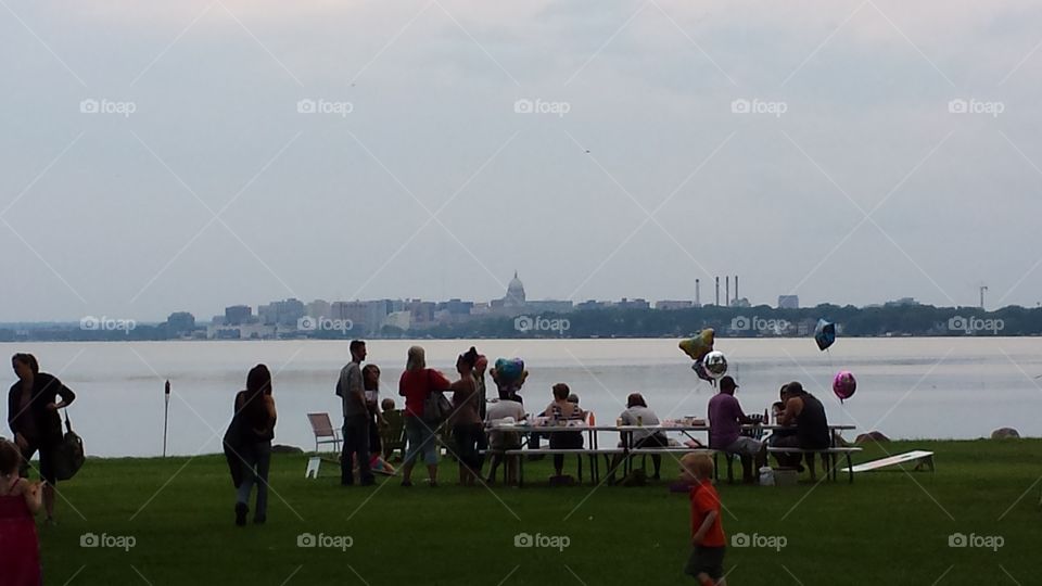 Party on the lake. Party with Madison Wi skyline and lake Mendota as backdrop
