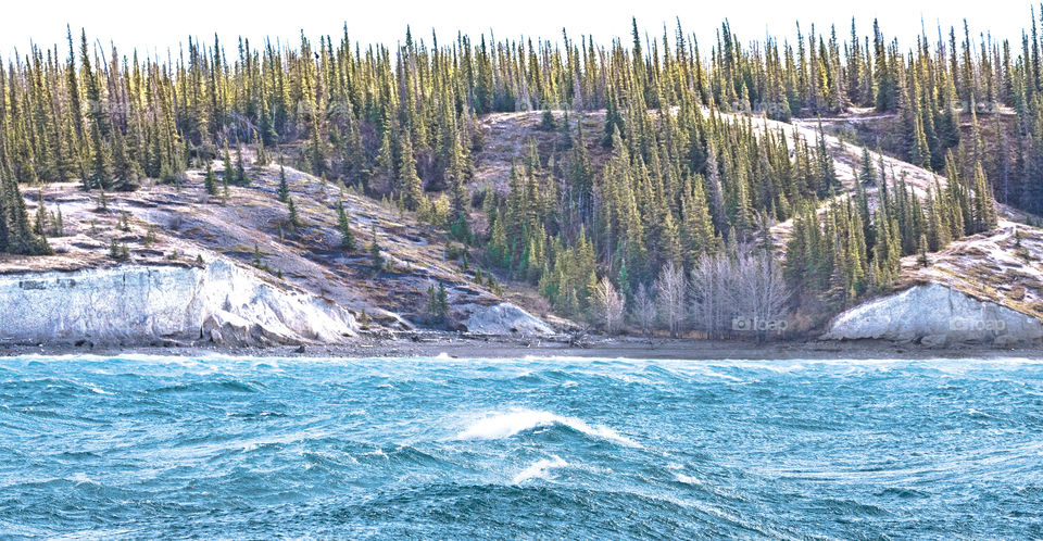 Abraham Lake Alberta Canada.  A really windy day whipped the lake into a frenzy.