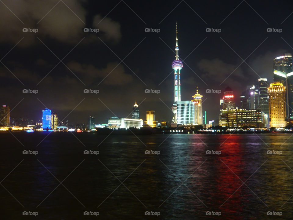 city buildings night lights by ether