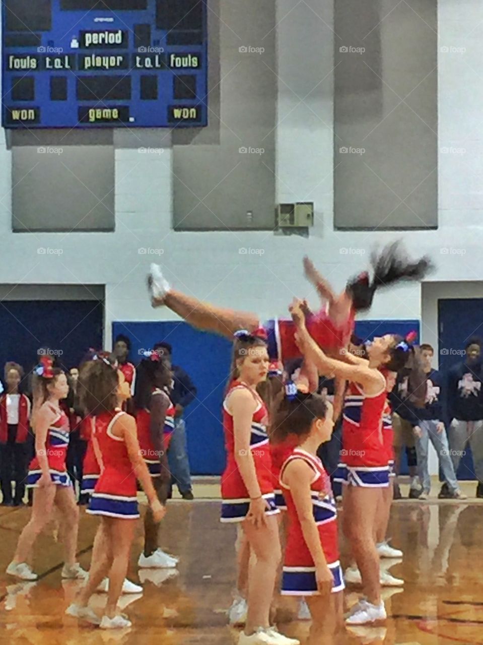 Cheering girls performing at court