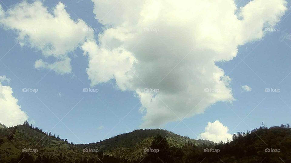 clouds around mountains