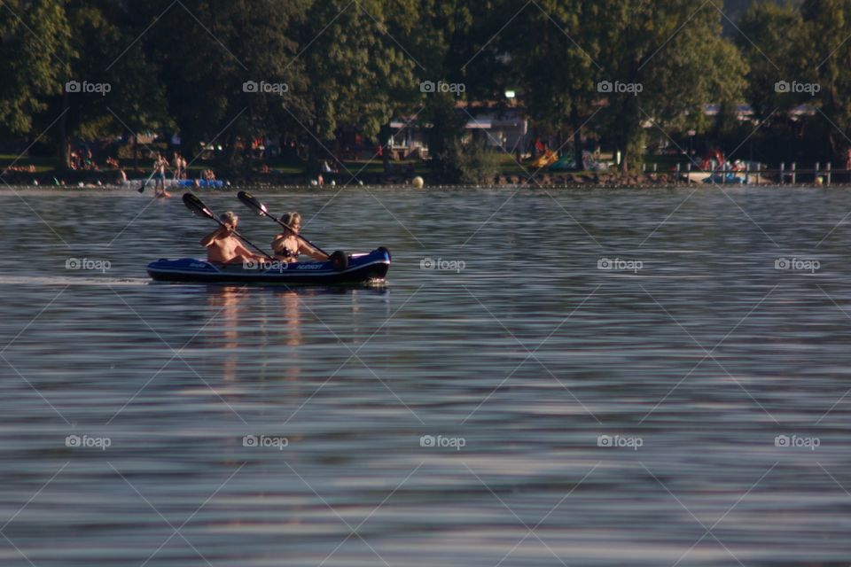 Elderly Couple In Rowboat At Sempach Lake