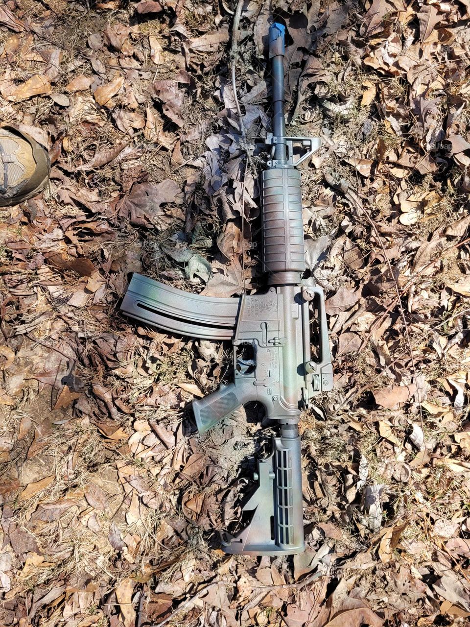 camouflage rifle
