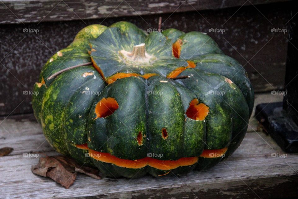 Original Jack-o-lantern made from a green pumpkin