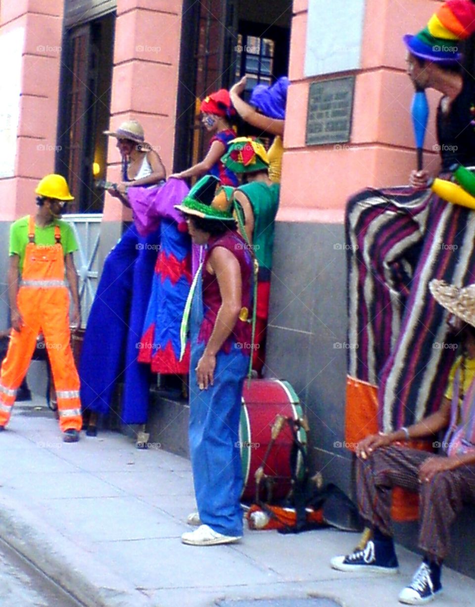 Cuba: Street Artists dressed up. Ready for a show with their percussion. On the road in L' Avana, Cuba.