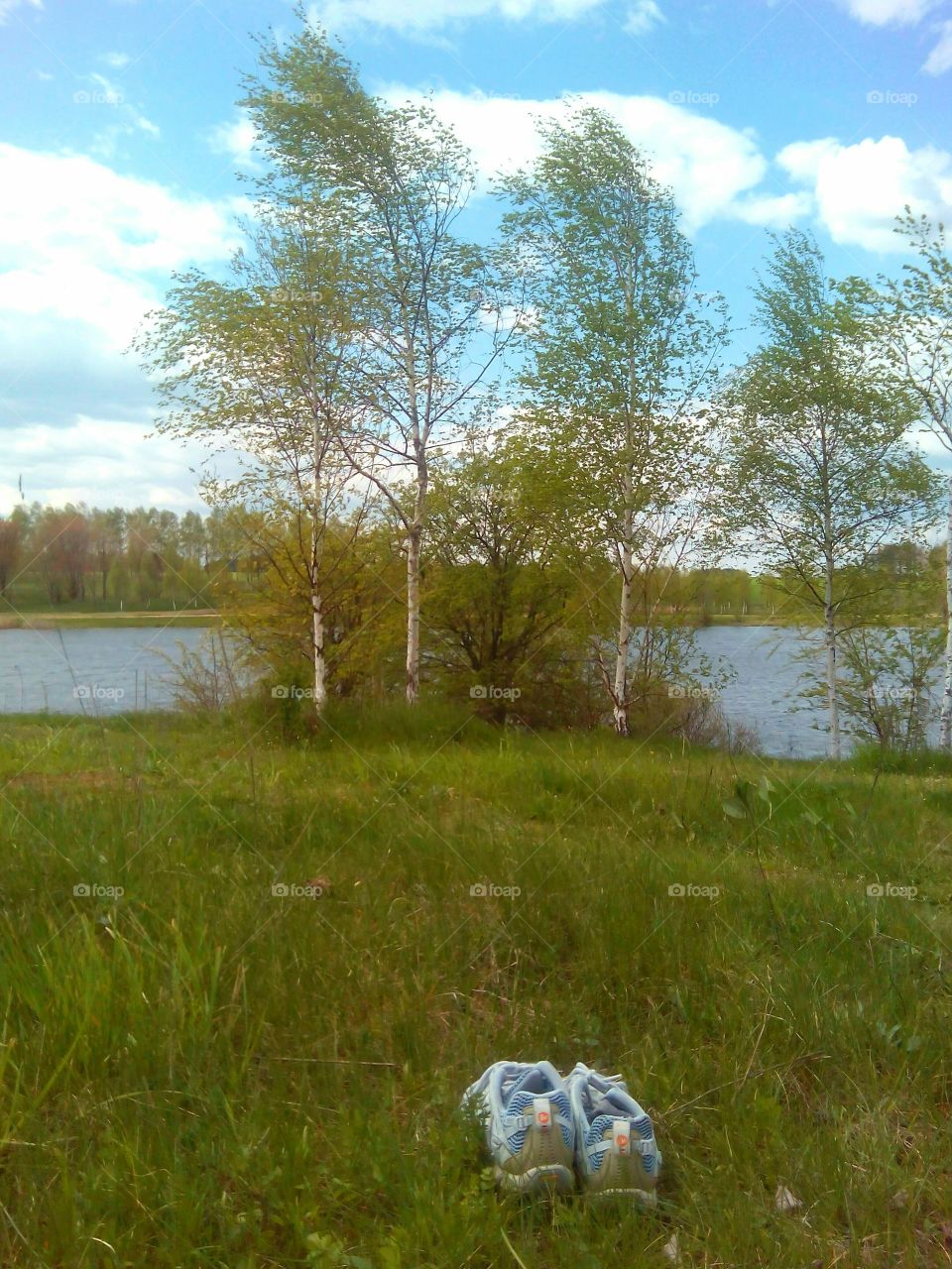 green landscape and shoes rest